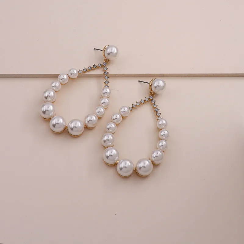 Extravagant Pearl Alloy Earrings with Celebrity Inspiration