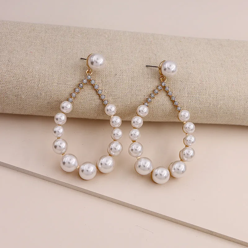 Extravagant Pearl Alloy Earrings with Celebrity Inspiration