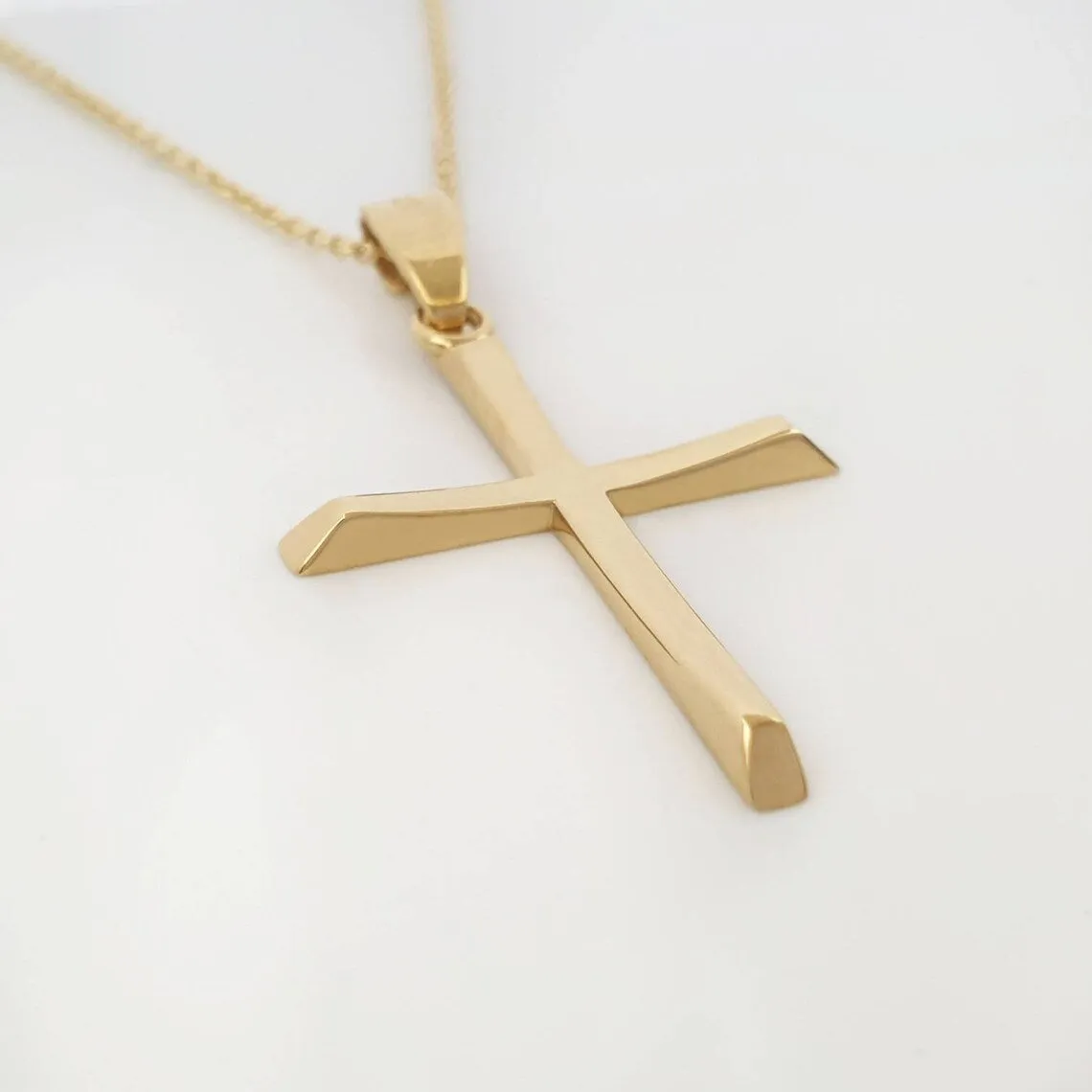 Gold cross of baptism